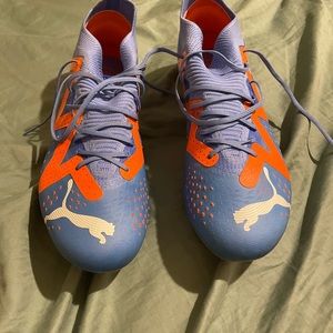 Puma athletic cleats.